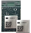 Top view of CEL CMP9010 Wi-Fi 6 / Bluetooth 5.4 wireless module with integrated PCB antenna,Shown next to its smaller LGA/Stamp package variant, both with metal shields.